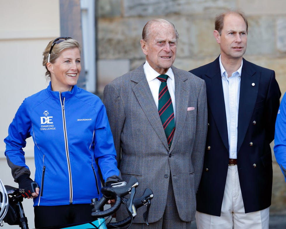 edinburgh, united kingdom september 19 embargoed for publication in uk newspapers until 48 hours after create date and time sophie, countess of wessex, prince philip, duke of edinburgh wearing the regimental tie of the rifles and prince edward, earl of wessex pose for a photograph before the countess leaves the palace of holyroodhouse on day one of her diamond challenge cycle ride on september 19, 2016 in edinburgh, scotland the countess of wessex is cycling 445 miles from the palace of holyroodhouse, edinburgh to buckingham palace, london over seven days as her diamond challenge, a special initiative marking the 60th anniversary of the duke of edinburghs award photo by max mumbyindigogetty images