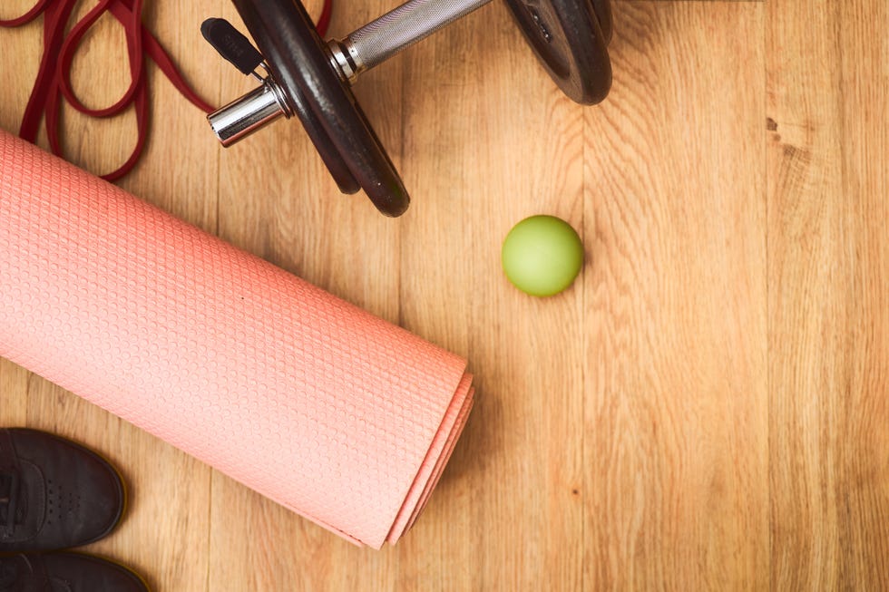 high angle view of dumbbell on hardwood floor in home