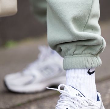 dusseldorf, germany   may 09  cathrina uellner, fashion influencer is seen wearing the julou oversized jogger pants in iceberg green and new balance 530 trainers in white on may 09, 2021 in dusseldorf, germany photo by mathis wienandgetty images