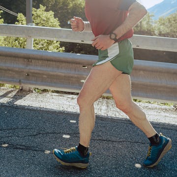 Male Runner male running on the road space for copy