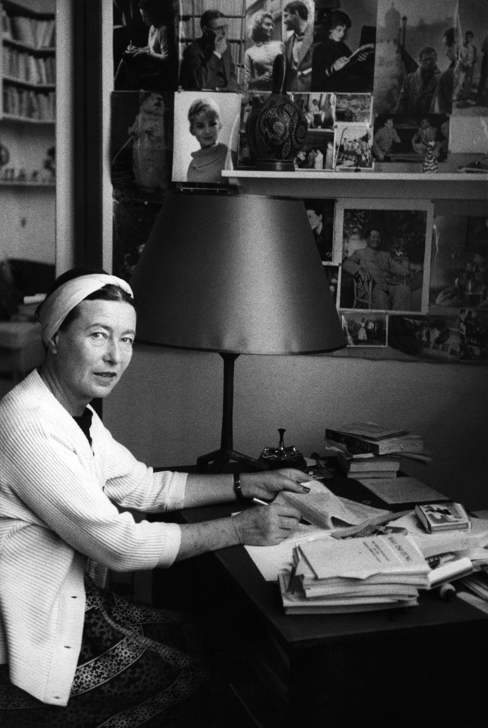 portrait of french author and philosopher simone de beauvoir 1908 1986 as she works at a table, paris, france, 1958 she was in the process of revising a manuscript of her memoirs photo by gisele freundphoto researchers historygetty images
