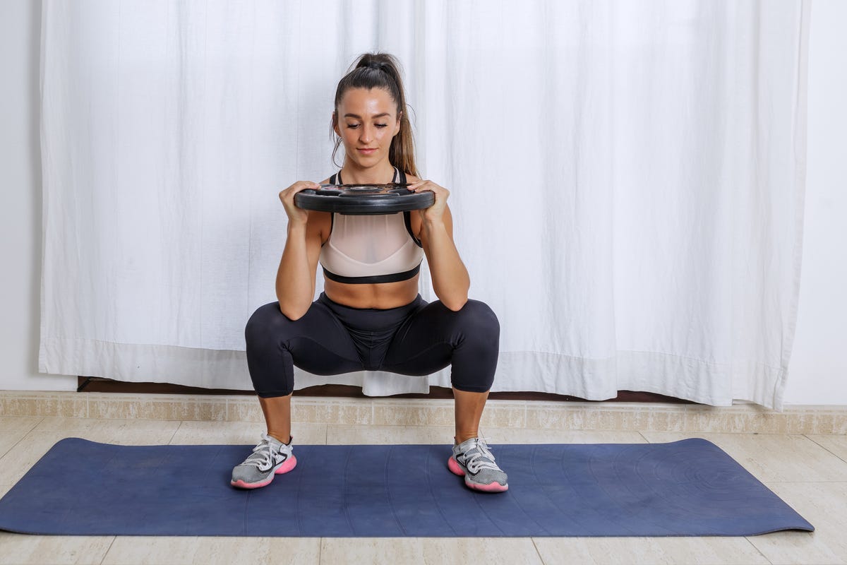 Build strength and mobility in one go with this 4-move weighted workout