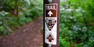 lower alsace township, pa   june 22 a trail marker that reads trail with an arrow, a graphic that reads trail courtesy with a graphic instructing people on bicycles to yield to runners and hikers, and runners to yield to hikers, then an arrow with the text protect your privilege, stay on the trail in the neversink mounatin preserve in lower alsace township tuesday Duringnoon june 22, 2021 photo by ben hastymedianews groupreading eagle via getty images