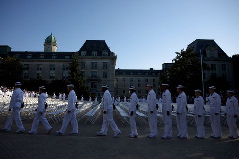 annapolis, maryland   june 30 plebes arrive for their oath of office ceremony at the end of the induction day at the us naval academy on june 30, 2021 in annapolis, maryland more than 1,100 new midshipmen arrived to take part in the induction day i day, the official first day of plebe summer due to the health and safety concerns associated with the covid 19 pandemic, the naval academys class of 2025 arrived over a two day period photo by anna moneymakergetty images