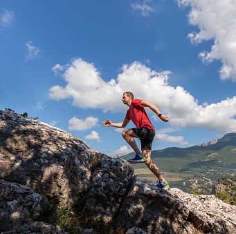 man running Leather on mountain