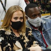 phoenix, arizona   july 17 singer adele looks on next to rich paul during the first half in game five of the nba finals between the milwaukee bucks and the phoenix suns at footprint center on july 17, 2021 in phoenix, arizona note to user user expressly acknowledges and agrees that, by downloading and or using this photograph, user is consenting to the terms and conditions of the getty images license agreement  photo by christian petersengetty images