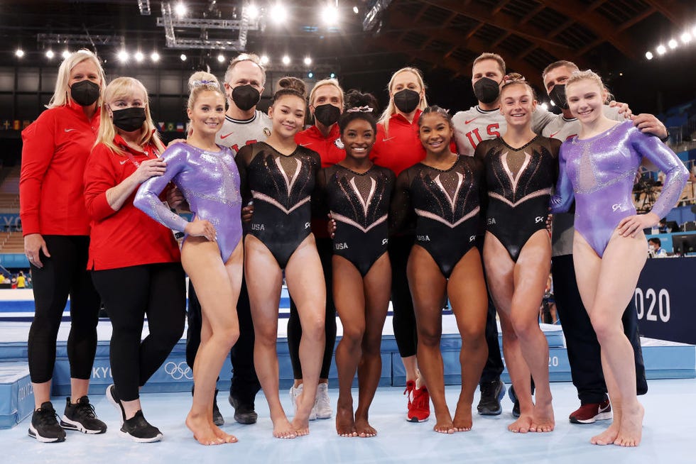 tokyo, japan july 22 l r mykayla skinner, sunisa lee, simone biles, jordan chiles, grace mccallum and jade carey of team united states pose for a picture with coaches during womens podium training ahead of the tokyo 2020 olympic games at ariake gymnastics centre on july 22, 2021 in tokyo, japan photo by jamie squiregetty images