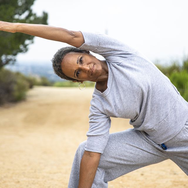 a senior black woman staying fit outdoors