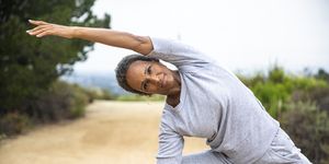 a senior black woman staying fit outdoors