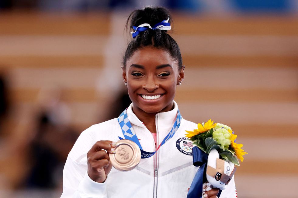 tokyo, japan august 03 simone biles of team united states poses with the bronze medal during the womens balance beam final medal ceremony on day eleven of the tokyo 2020 olympic games at ariake gymnastics centre on august 03, 2021 in tokyo, japan photo by jamie squiregetty images