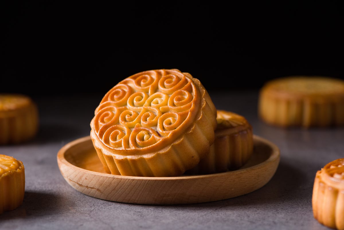 traditional chinese moon cake on a plate