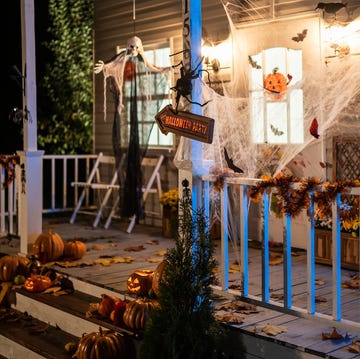Halloween Jack-o-Lantern Pumpkins on a porch stairs halloween jack o lantern pumpkins on a porch stairs