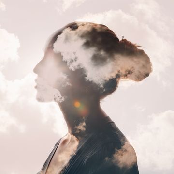 psychology and woman mental health concept multiple exposure clouds and sun on female head silhouette