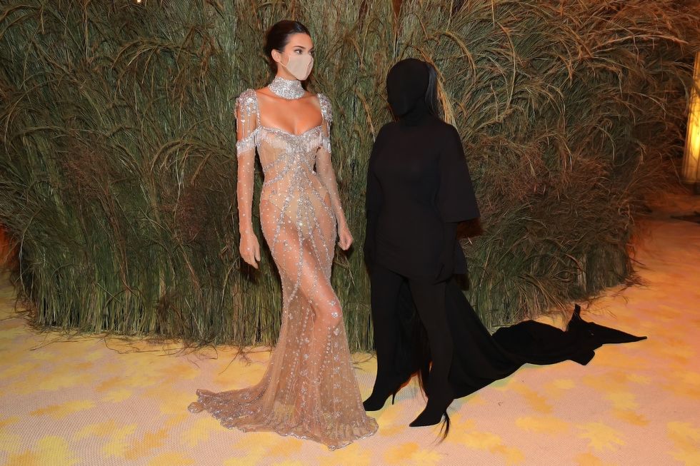 new york, new york   september 13 exclusive coverage kendall jenner and kim kardashian west attend the the 2021 met gala celebrating in america a lexicon of fashion at metropolitan museum of art on september 13, 2021 in new york city photo by jamie mccarthymg21getty images for the met museumvogue
