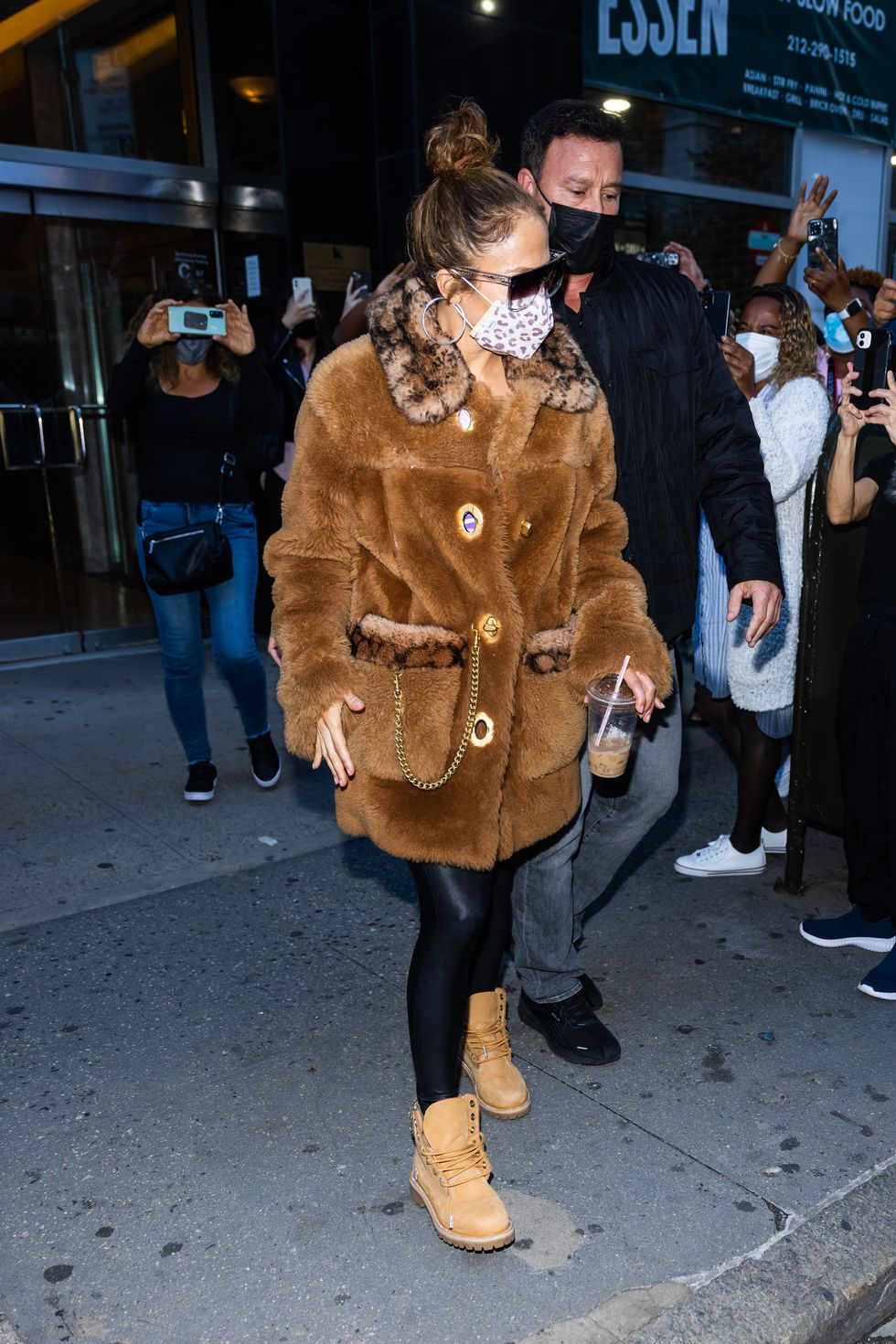 Jennifer Lopez Struts in Fur Coat, Leggings & Swarovski Work Boots
