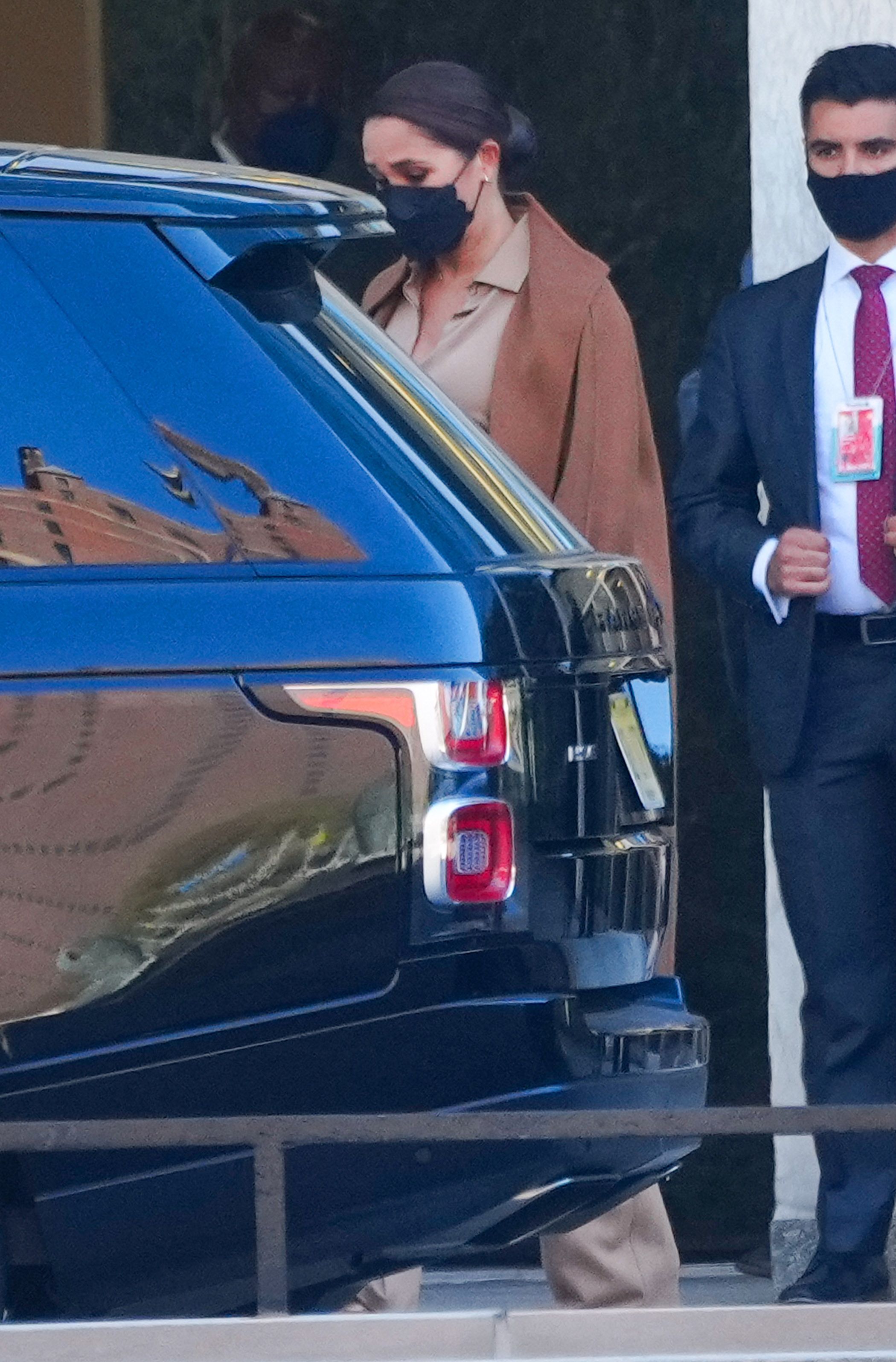 Photos: Meghan Markle steps out in camel coat in California with mysterious  patch - Vanguard News