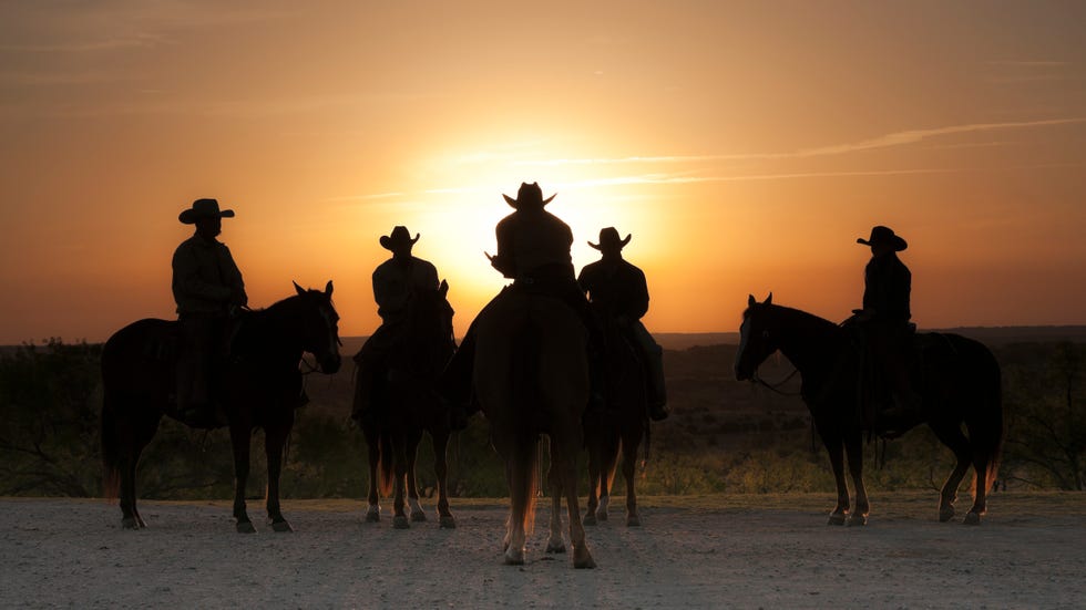 cowboys and cowgirl at sunrise, weatherford, texas