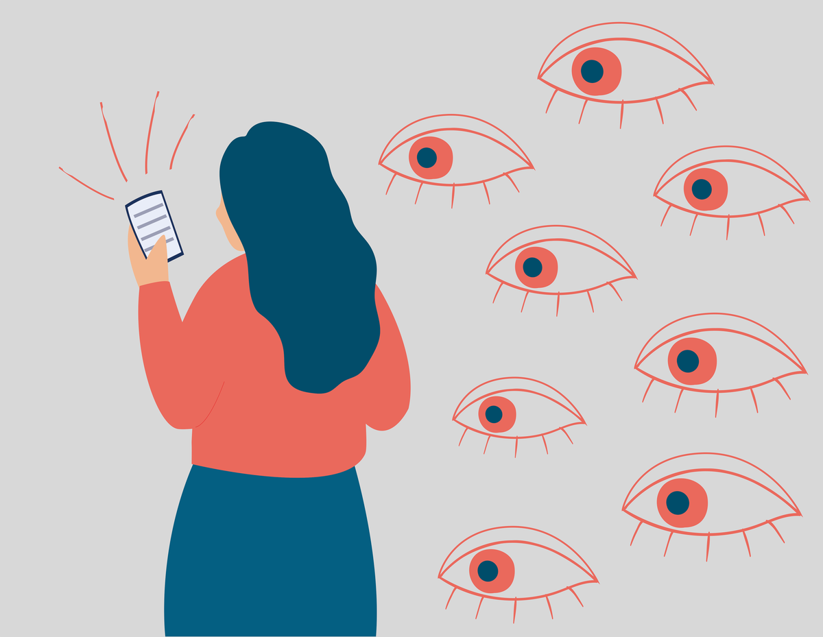 woman looking at smartphone
