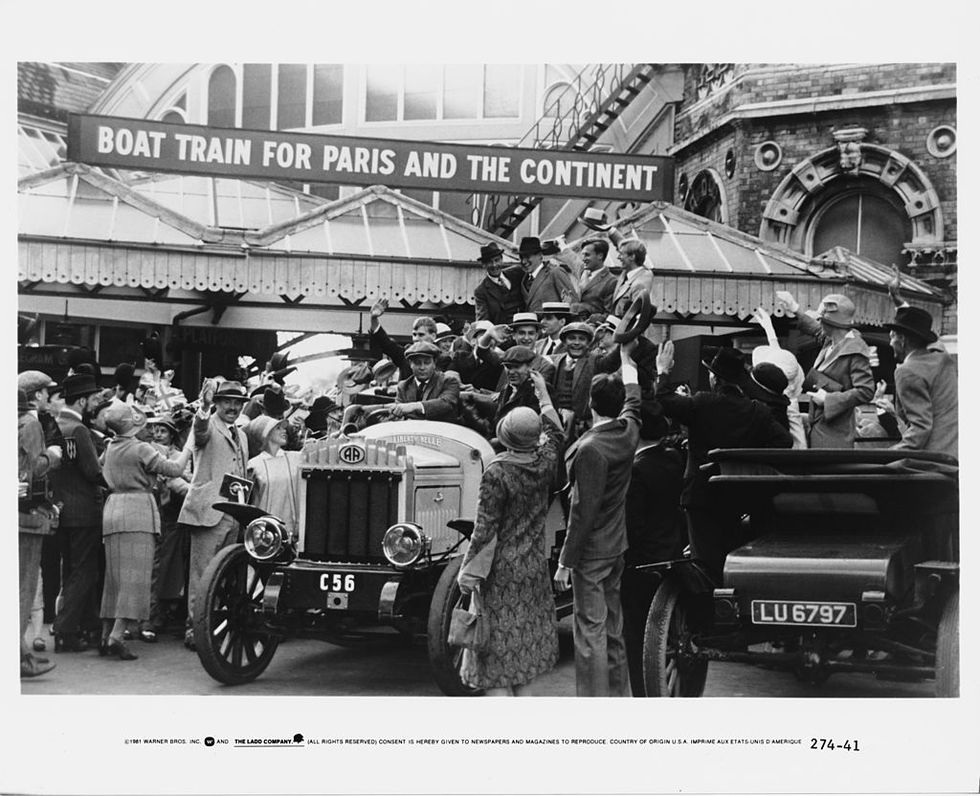 the british team returns home triumphant after the paris olympics, in a scene from chariots of fire, directed by hugh hudson, 1981 at centre top left are ian charleson 1949 1990 as eric liddell and ben cross as harold abrahams photo by warner brosarchive photosgetty images