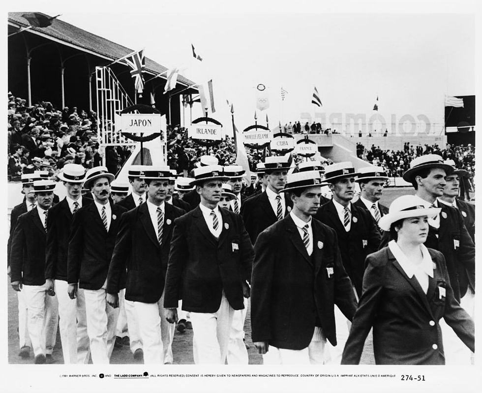 the british team parading at the 1924 olympics in a scene from chariots of fire, directed by hugh hudson, 1981 among the actors are ian charleson 1949 1990, centre, left as eric liddell and ben cross fifth from right as harold abrahams the scene was filmed at the oval sports centre at bebington, merseyside photo by warner brosarchive photosgetty images