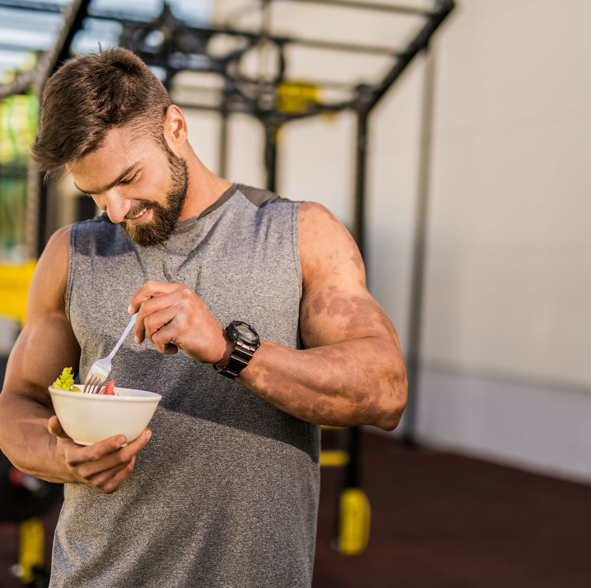 fit person eating pre workout snack