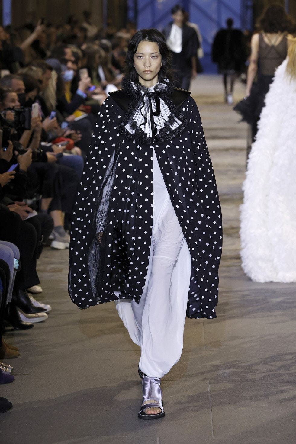 A model walks the runway during Louise Green Hats Spring/Summer News  Photo - Getty Images