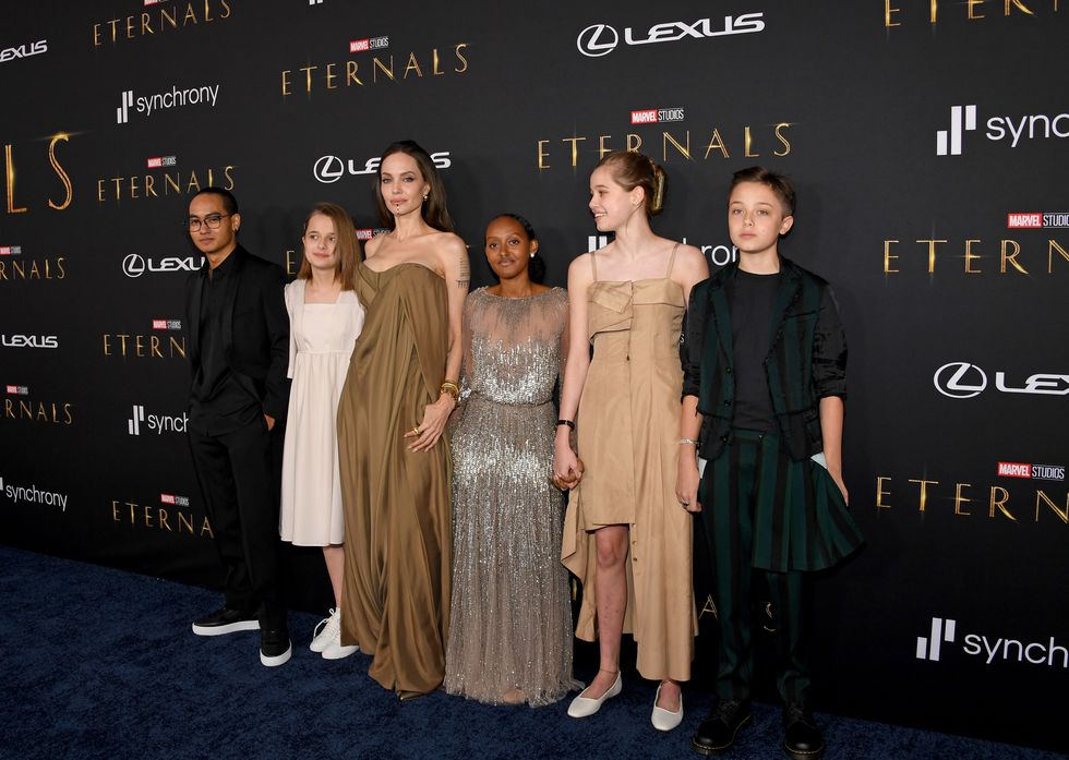 los angeles, california   october 18 l r maddox jolie pitt, vivienne jolie pitt, angelina jolie, zahara jolie pitt, shiloh jolie pitt, and knox jolie pitt arrive for the world premiere of marvel studios’ eternals at the el capitan theatre in hollywood on october 18, 2021 photo by jon kopaloffgetty images for lexus
