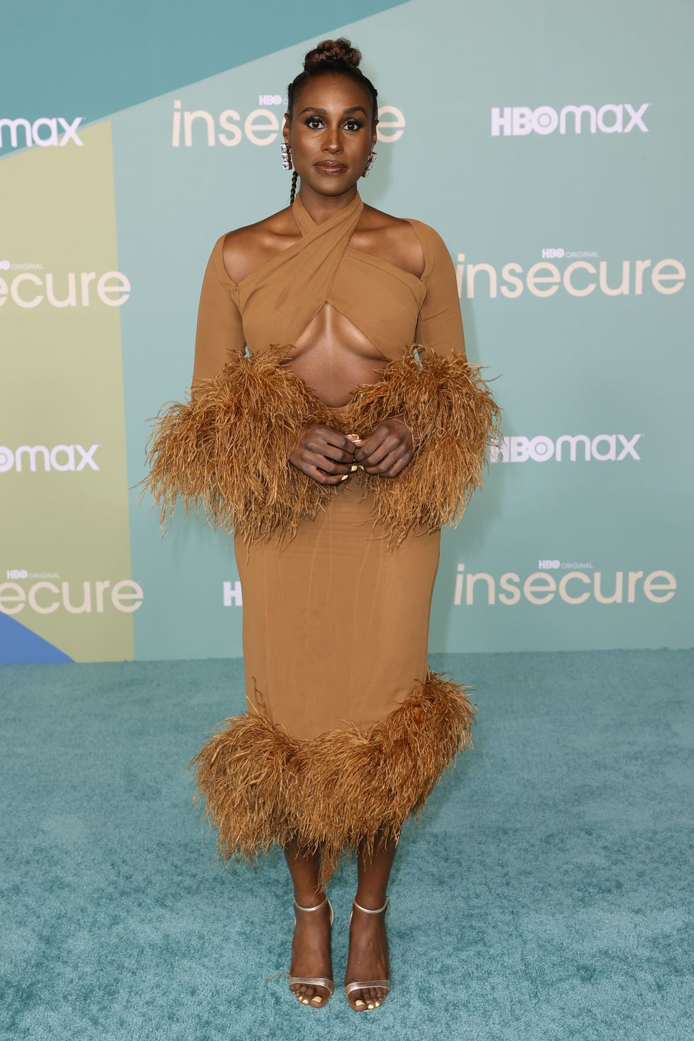 issa rae wears a rokh cutout dress to hbos final season premiere of insecure