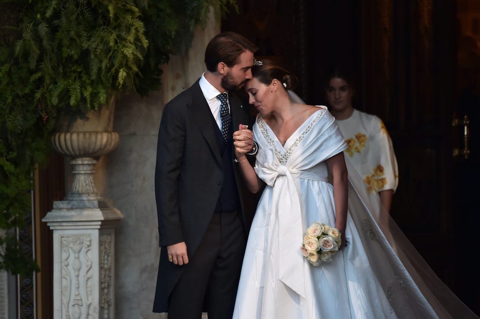 athens, greece   october 23 philippos, son of former king of greece constantine ii, and his wife nina flohn leave the athens orthodox cathedral following their wedding ceremony at the metropolis greek orthodox cathedral on october 23, 2021 in athens, greece photo by milos bicanskigetty images