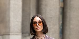 london, england   september 17 melis ekrem wears vehla sunglasses, depop shirt, abercrombie and fitch blazer and a collusion skirt during london fashion week september 2021 on september 17, 2021 in london, england photo by kirstin sinclairgetty images