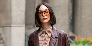 london, england   september 17 melis ekrem wears vehla sunglasses, depop shirt, abercrombie and fitch blazer and a collusion skirt during london fashion week september 2021 on september 17, 2021 in london, england photo by kirstin sinclairgetty images