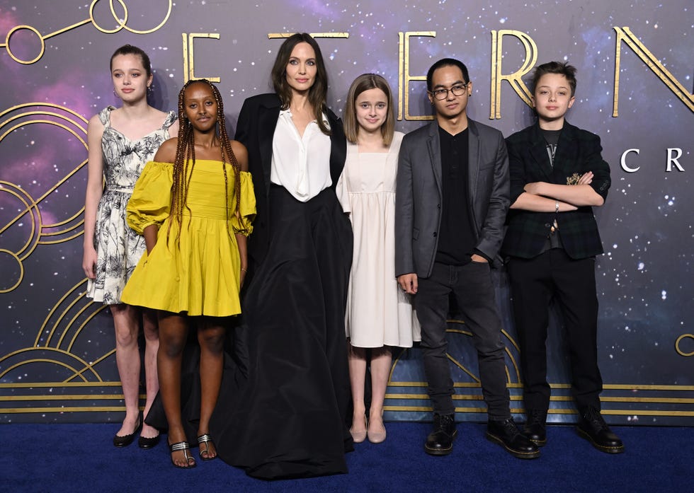 London, England October 27 LR Shiloh Jolie Pitt, Zahara Jolie Pitt, Angelina Jolie, Vivienne Jolie Pitt, Maddox Jolie Pitt and Knox Jolie Pitt attend the UK premiere of The Eternals at BFI IMAX Waterloo on October 27, 2021 in London, England , Photo by Karwai Tangwireimage