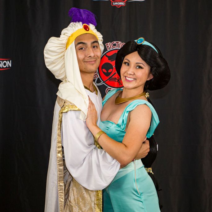 cosplayers noah aguilar as aladdin l and irene yu as princess jasmine from aladdin attend fandom invasion at california center for the arts, escondido