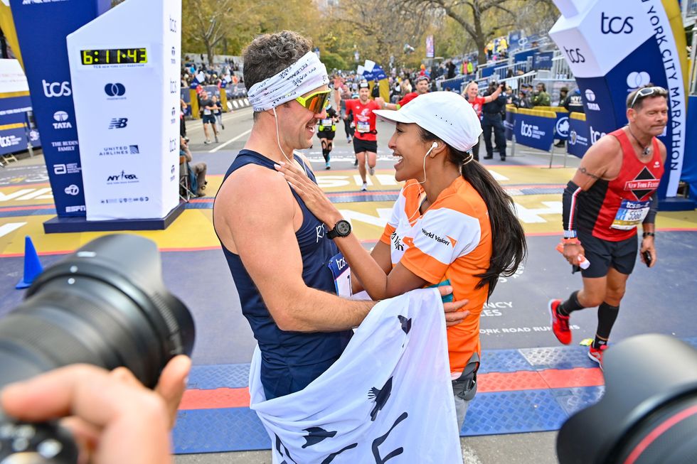 new york, new york   november 07 zac clark and tayshia adams are seen during the 2021 tcs new york city marathon on november 07, 2021 in new york city photo by bryan beddernew york road runners via getty images