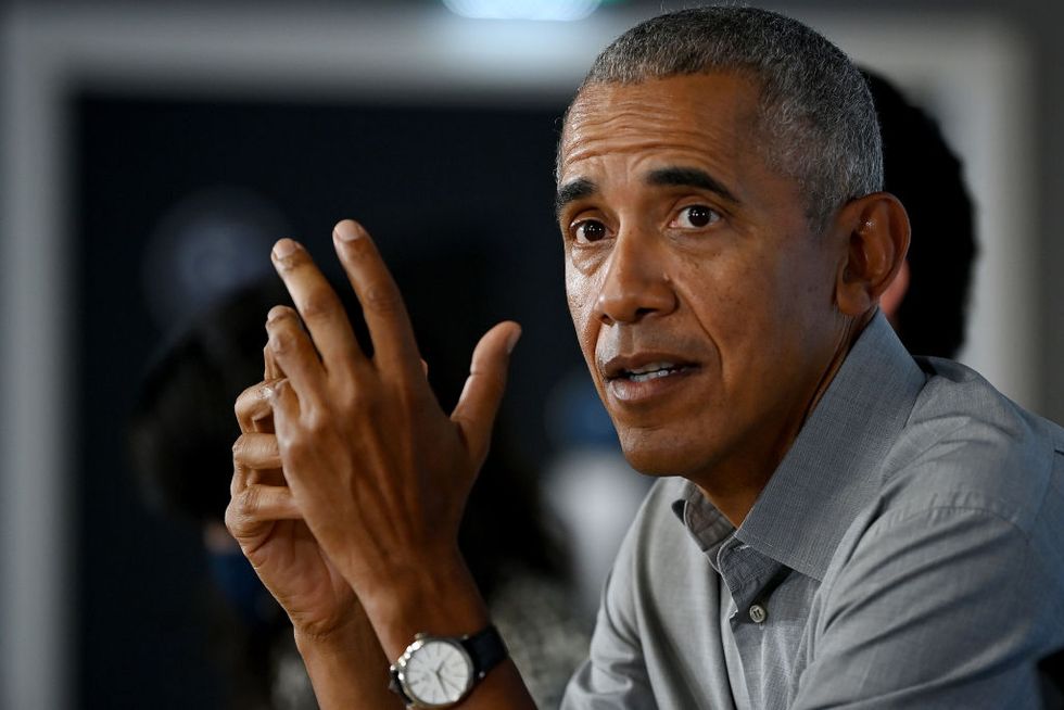 glasgow, scotland november 08 former us president barack obama gestures as he speaks during a round table meeting at the university of strathclyde on november 08, 2021 in glasgow, scotland day nine of the 2021 climate summit in glasgow will focus on delivering the practical solutions needed to adapt to climate impacts and address loss and damage this is the 26th conference of the parties and represents a gathering of all the countries signed on to the un framework convention on climate change and the paris climate agreement the aim of this years conference is to commit countries to net zero carbon emissions by 2050 photo by jeff j mitchellgetty images