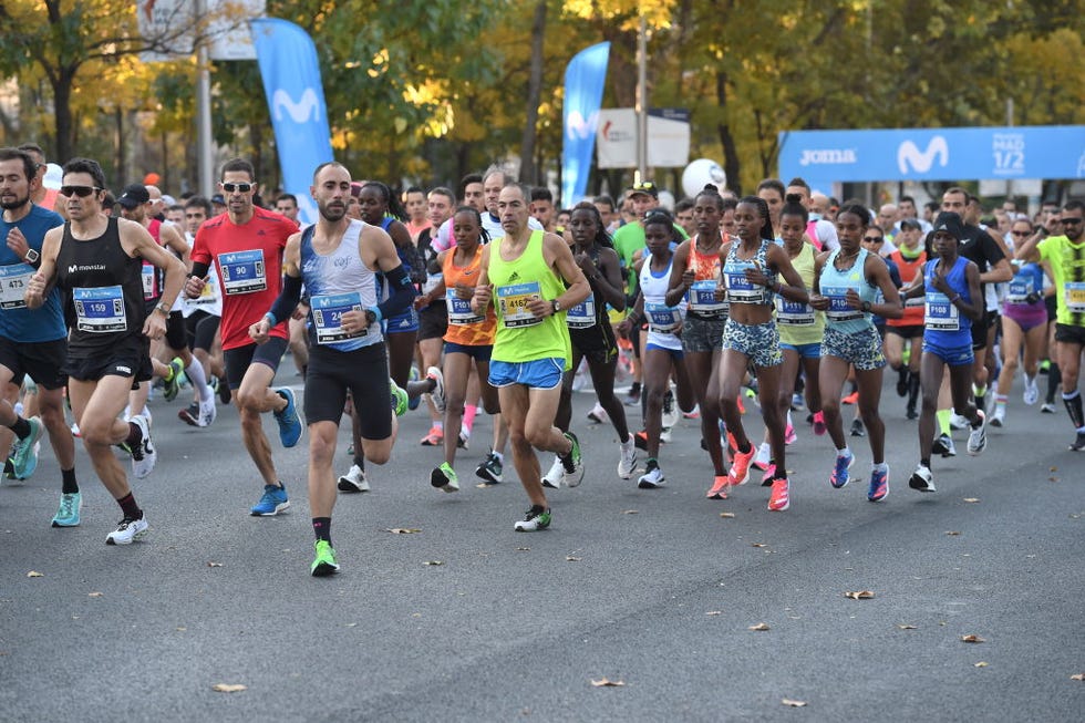 madrid, spain november 14 several runners participate in the 20th madrid half marathon, on 14 november, 2021 in madrid, spain madrid hosts this sunday its xx half marathon, which returns to the capital after being suspended in the last edition because of the pandemic the race consists of 21,097 metres it starts at the paseo de la castellana and finishes at the paseo de recoletos along the way, runners pass by emblematic areas of the capital, such as the santiago bernabeu stadium, plaza de castilla, puerta de alcala, atocha station and the cibeles fountain photo by gustavo valienteeuropa press via getty images