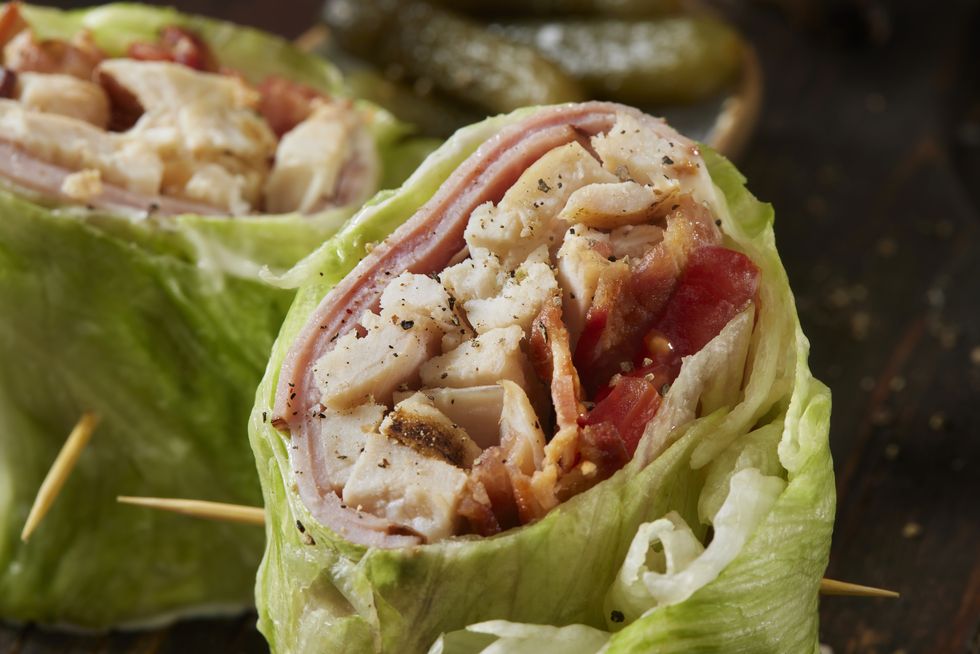 roast chicken blt lettuce wrap sandwich with black forest ham, bacon, lettuce, tomato and mayo
