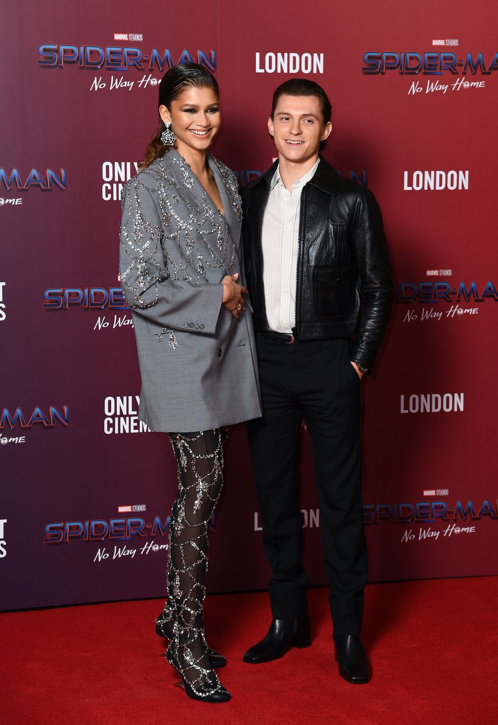 london, england   december 05 l r zendaya and tom holland attend a photocall for spiderman no way home at the old sessions house on december 05, 2021 in london, england photo by gareth cattermolegetty images