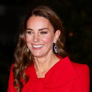 Members Of The Royal Family Attend "Together At Christmas" Community Carol Service london, united kingdom december 08 embargoed for publication in uk newspapers until 24 hours after create date and time catherine, duchess of cambridge wearing queen elizabeth, the queen mother's sapphire and diamond fringe earrings attends the 'together at christmas' community carol service at westminster abbey on december 8, 2021 in london, england the carol service, hosted and spearheaded by the duchess of cambridge, pays tribute to the work of individuals and organisations across the uk who have supported their communities through the covid 19 pandemic photo by max mumbyindigogetty images