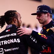 abu dhabi, united arab emirates   december 12 race winner and 2021 f1 world drivers champion max verstappen of netherlands and red bull racing is congratulated by runner up in the race and championship lewis hamilton of great britain and mercedes gp during the f1 grand prix of abu dhabi at yas marina circuit on december 12, 2021 in abu dhabi, united arab emirates photo by mario renzi   formula 1formula 1 via getty images