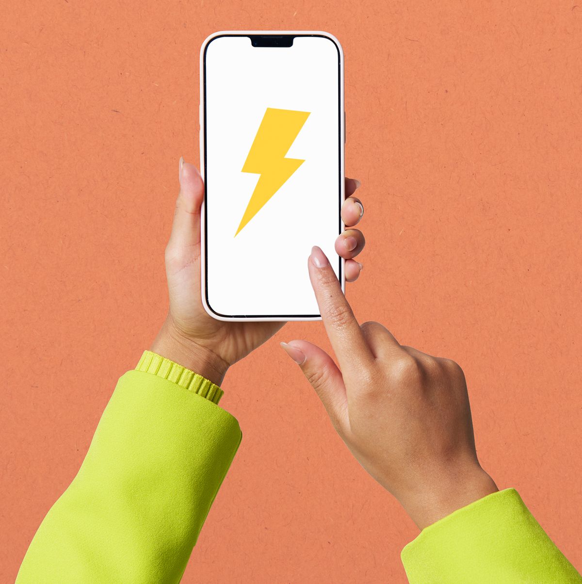 person holding a phone with a lightening bolt on top