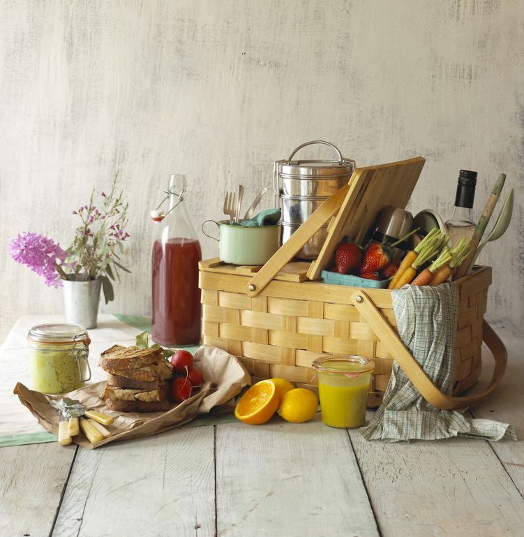 Picnic Basket with Food and Flowers