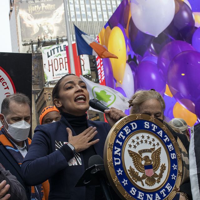 new york, new york   january 23 congresswoman alexandria ocasio cortez joins delivery workers to celebrate the passage of legislation by the new york city council guaranteeing them basic labor rights such as wages, tips, and rest areas, january 23, 2022 in times square, new york city photo by andrew lichtensteincorbis via getty images