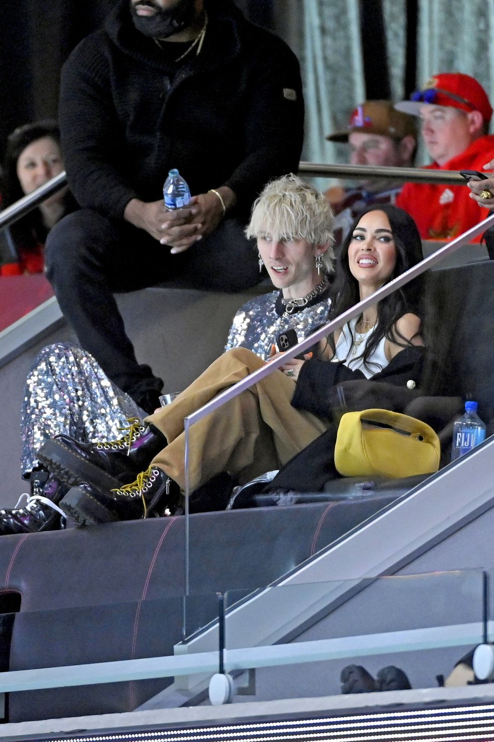 las vegas, nevada   february 05 l r machine gun kelly and megan fox are seen in the stands after his performance during the 2022 honda nhl all star game at t mobile arena on february 05, 2022 in las vegas, nevada photo by david beckergetty images