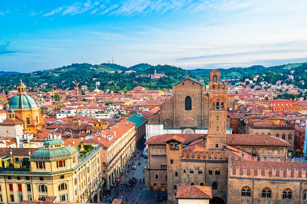 Aerial view of Bologna Cathedral and towers above of the roofs of Old Town in medieval city Bologna aerial view of bologna cathedral and towers above of the roofs of old town in medieval city bologna high quality photo