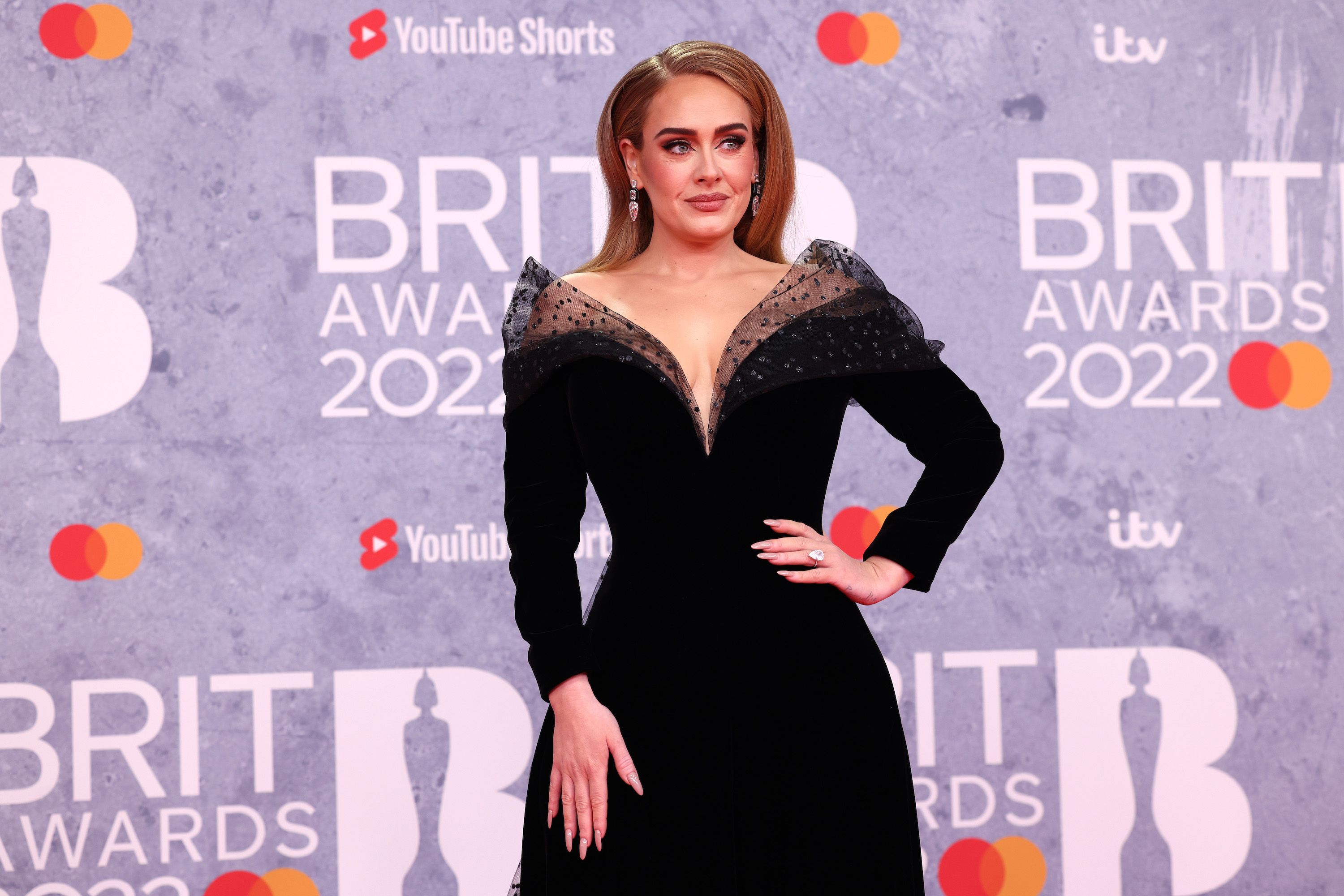 Adele Wore a Dramatic Black Velvet Gown to the BRIT Awards