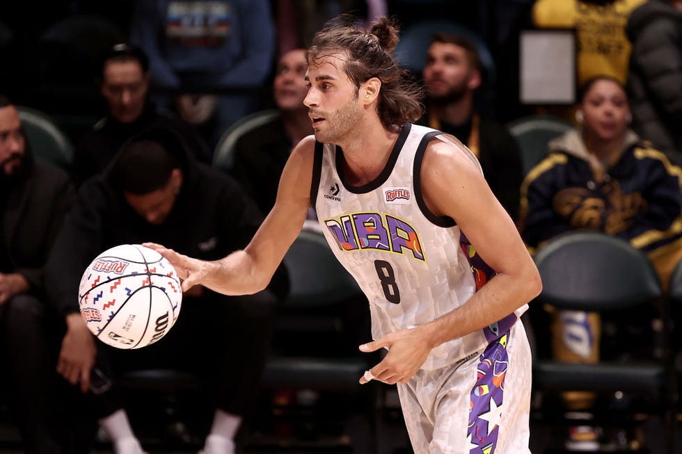 cleveland, ohio february 18 gianmarco tamberi 8 of team nique dribbles the ball during the ruffles nba all star celebrity game during the 2022 nba all star weekend at wolstein center on february 18, 2022 in cleveland, ohio note to user user expressly acknowledges and agrees that, by downloading andor using this photograph, user is consenting to the terms and conditions of the getty images license agreement photo by arturo holmesgetty images