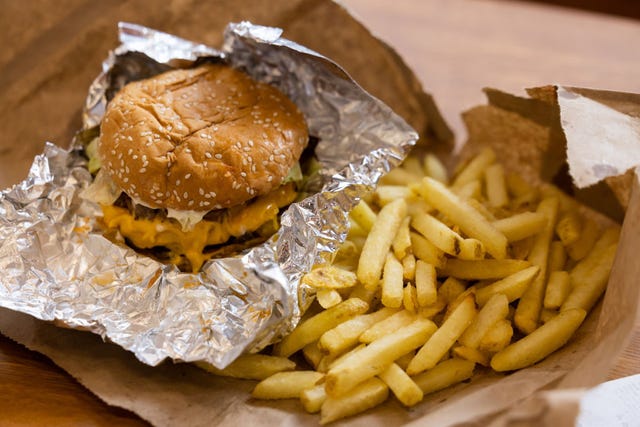 an order of a burger and french fries at us burger restaurant chain five guys