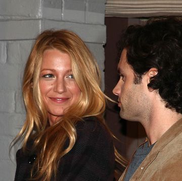 new york, ny january 26 l r blake lively and penn badgley attend the mayoral proclamation in celebration of the gossip girl 100th episode at silver cup studios on january 26, 2012 in new york city photo by paul zimmermanwireimage