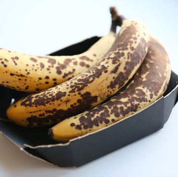 browning ripe bananas in a container